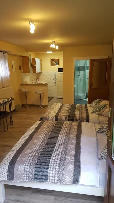 Posteľ alebo postele v izbe v ubytovaní Guest House Wolf