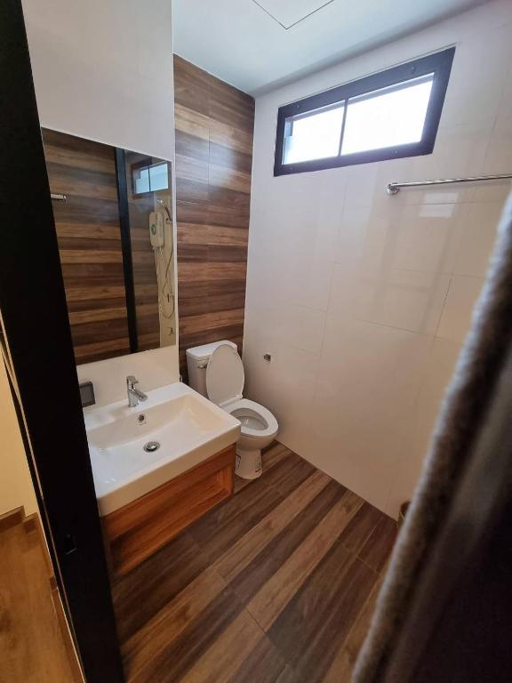 Koupelna v ubytování Pimann Place Hotel