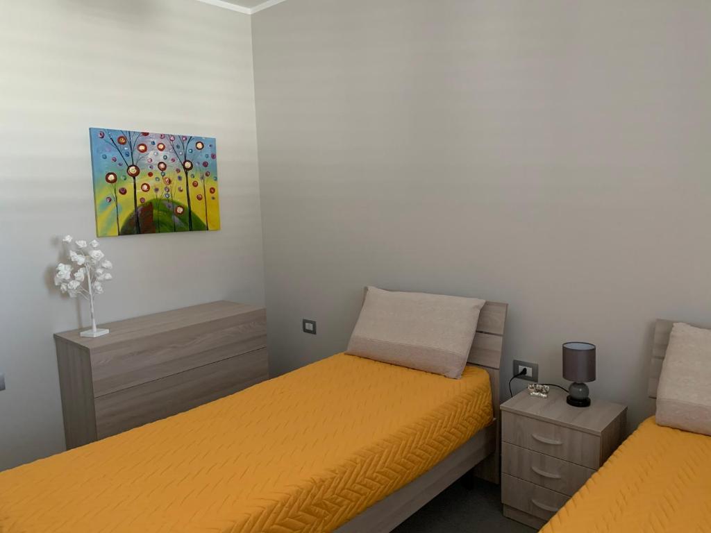 A bed or beds in a room at house231