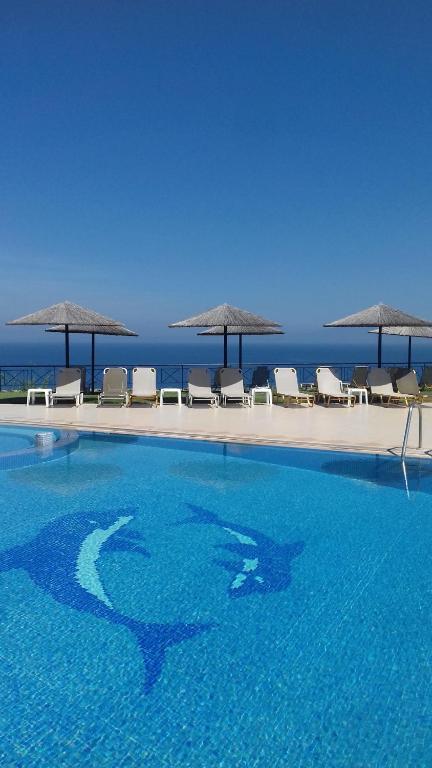Bazén v ubytování Aegean Blue Studios nebo v jeho okolí