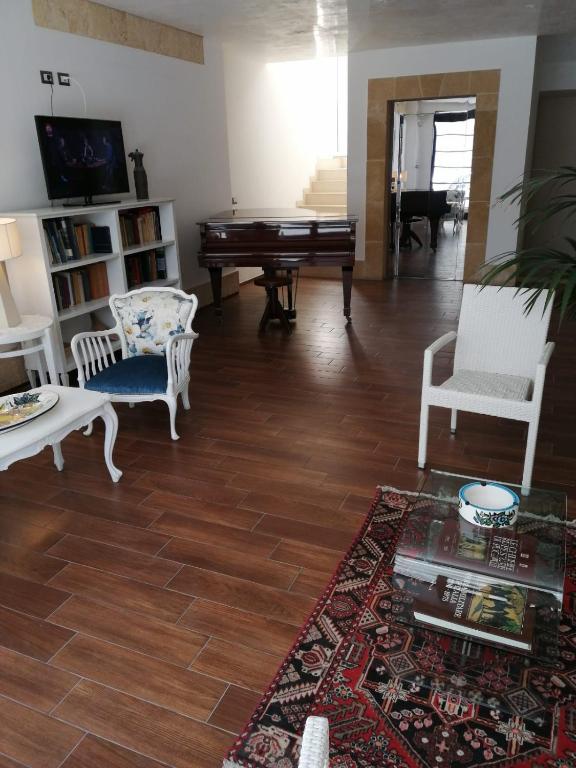 TV a/nebo společenská místnost v ubytování Felicity Residence
