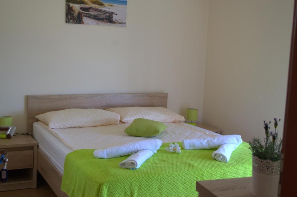 Postel nebo postele na pokoji v ubytování Sunčana Sara