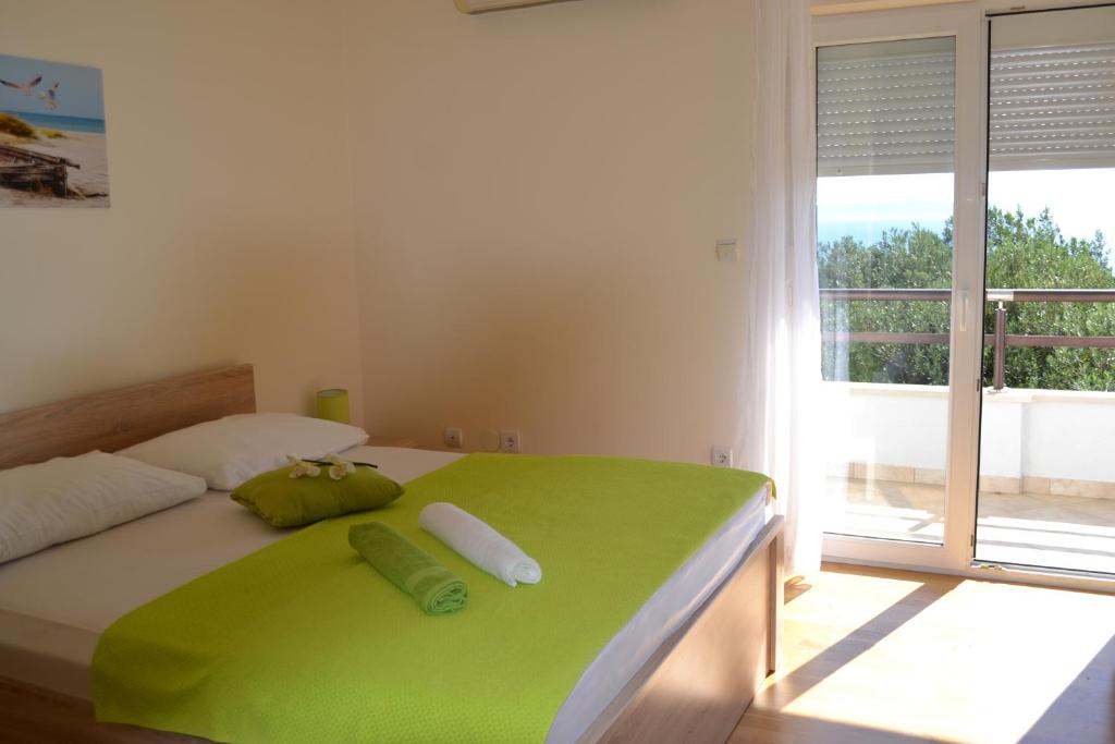 Postel nebo postele na pokoji v ubytování Sunčana Sara