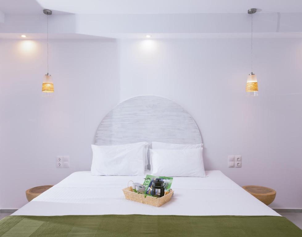 A bed or beds in a room at Die Zwei Brüder Art & Suites