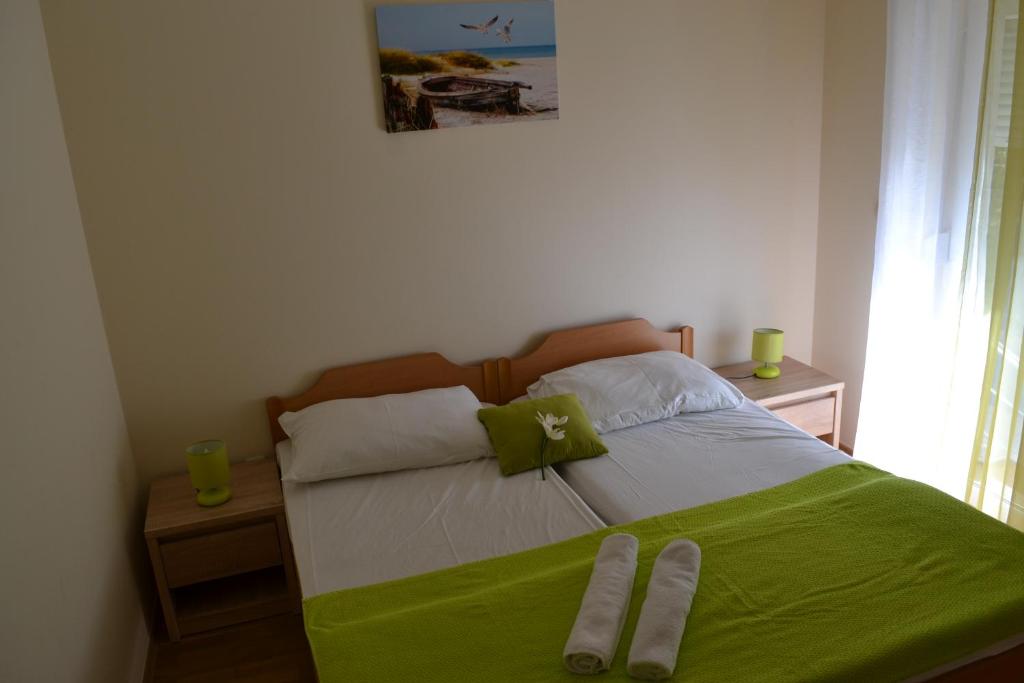 Postel nebo postele na pokoji v ubytování Sunčana Sara