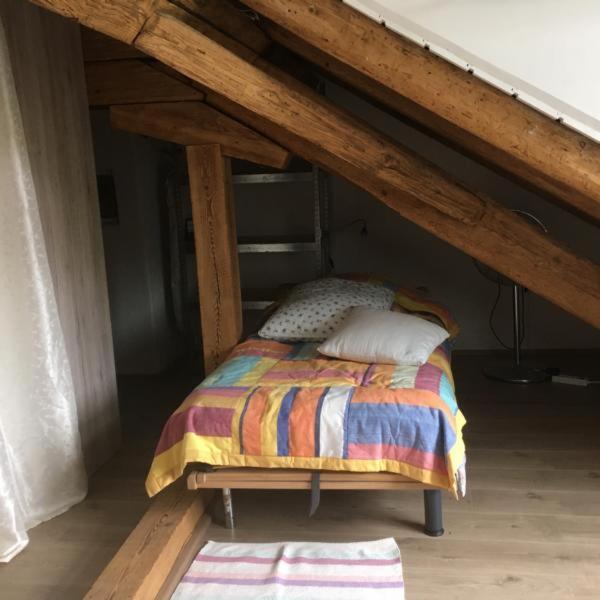 Postel nebo postele na pokoji v ubytování Bodensee Moosburg Biohof am See