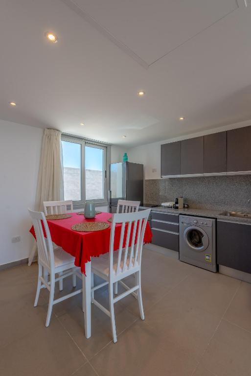 Kuchyň nebo kuchyňský kout v ubytování VESTA - El Gouna Residence