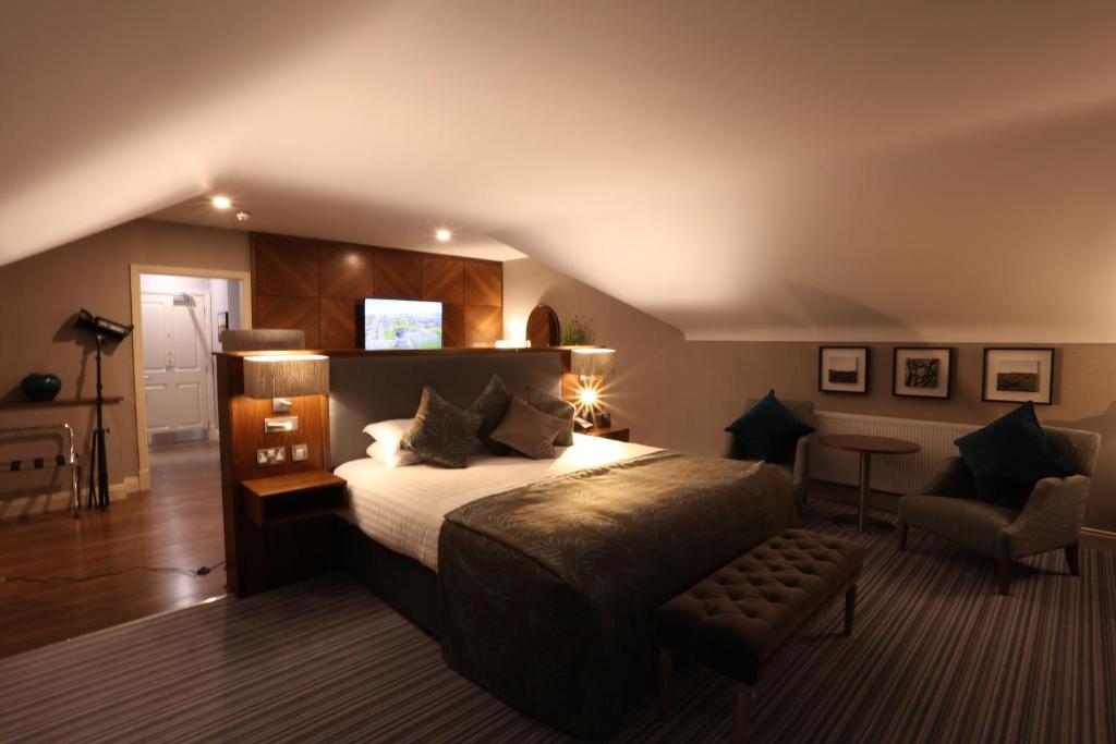 Voodi või voodid majutusasutuse Vaughan Lodge Hotel toas