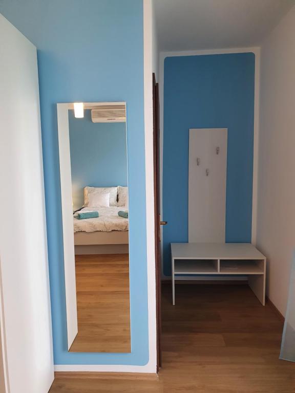 Posteľ alebo postele v izbe v ubytovaní APARTMAN VIDA 2