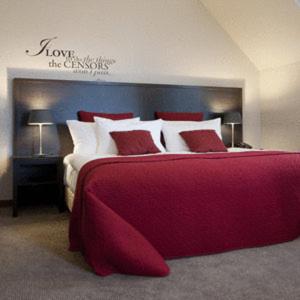 Postel nebo postele na pokoji v ubytování Comm Hotel Poznań Airport