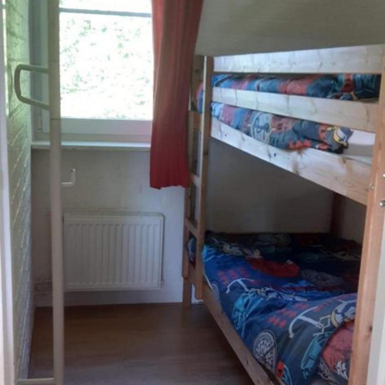 Postel nebo postele na pokoji v ubytování Robbenoort 45