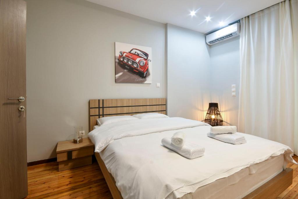 Posteľ alebo postele v izbe v ubytovaní Thessaloniki Center Luxury Apartment