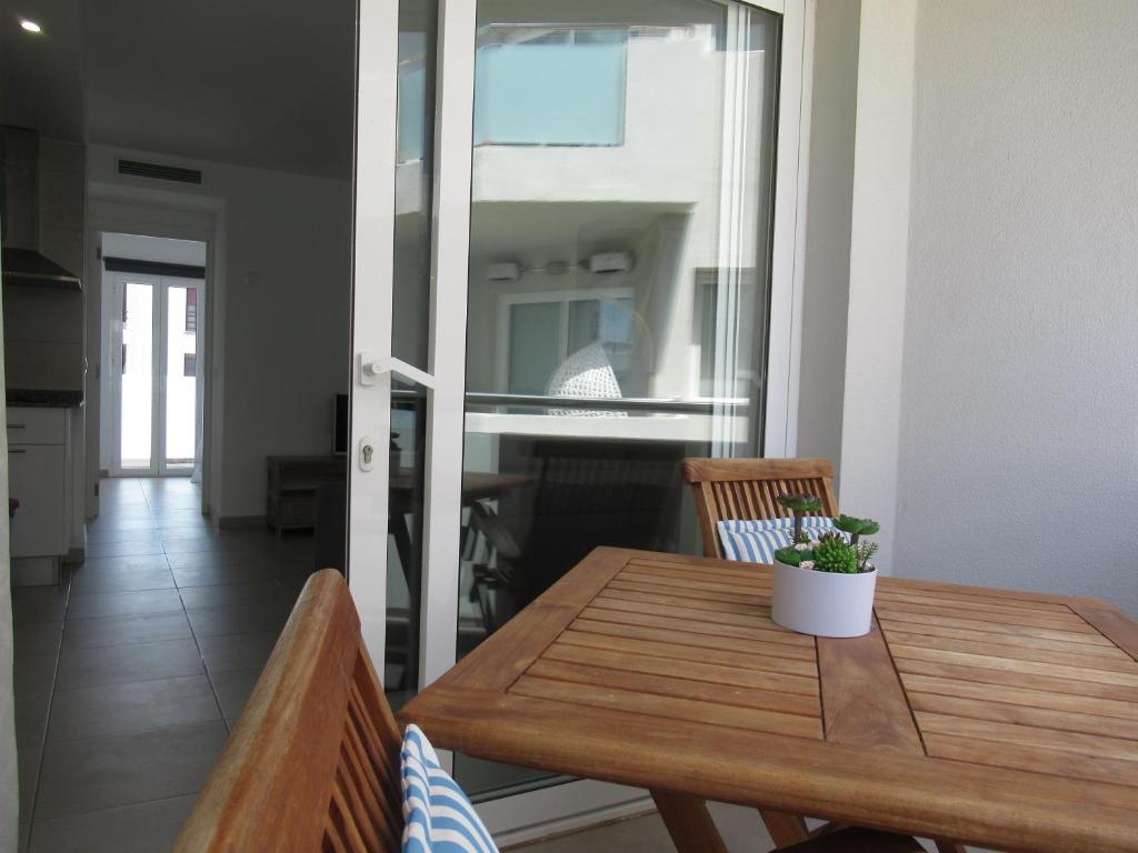 A kitchen or kitchenette at La Rosita Sun Apartments, by Comfortable Luxury