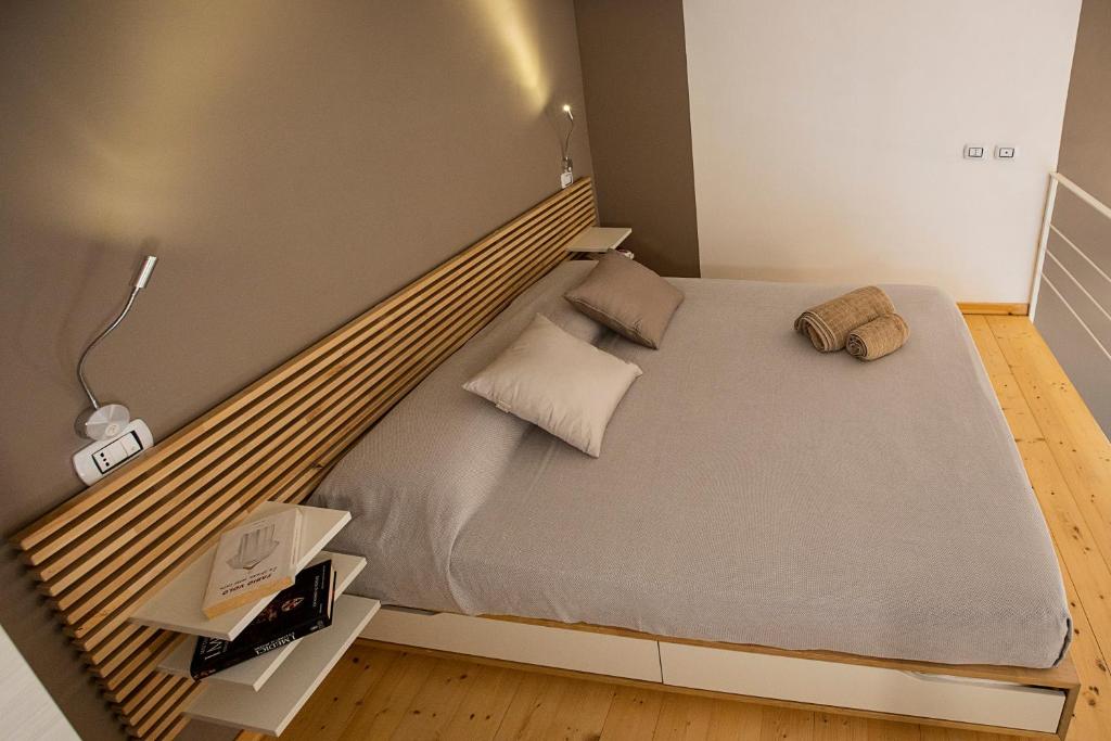 A bed or beds in a room at MiniLoft25