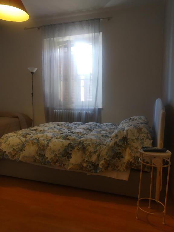 Łóżko lub łóżka w pokoju w obiekcie B&B Iris