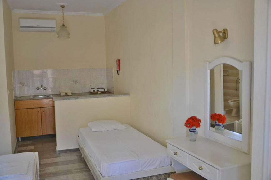 Postel nebo postele na pokoji v ubytování Seafront Apartments