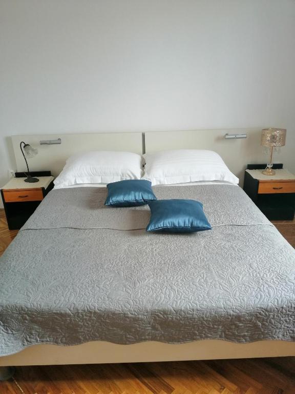 Postel nebo postele na pokoji v ubytování Olive Garden Accomodation