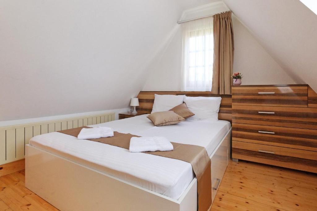 Voodi või voodid majutusasutuse Apartments Bohemia toas