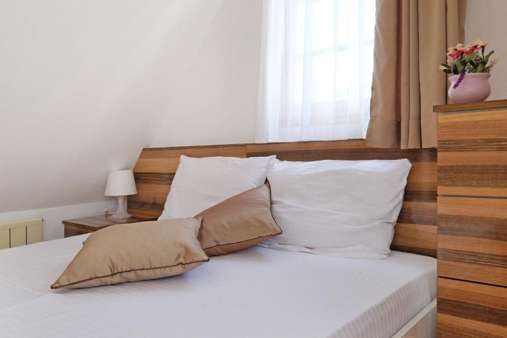 Voodi või voodid majutusasutuse Apartments Bohemia toas