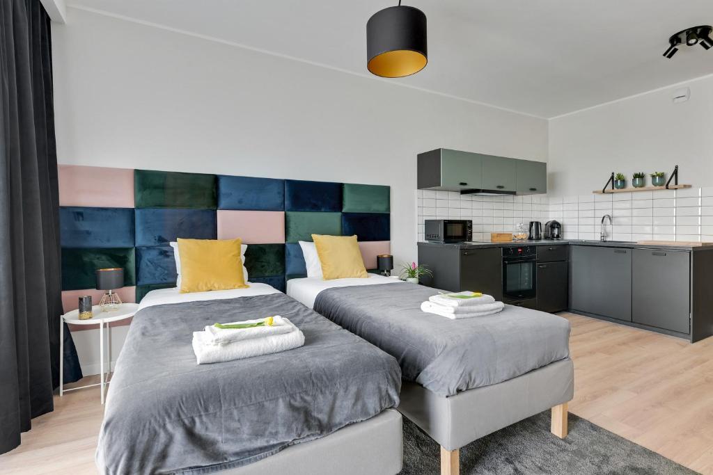 Kuchyňa alebo kuchynka v ubytovaní Apartament Wałowa Shipyard Gdańsk
