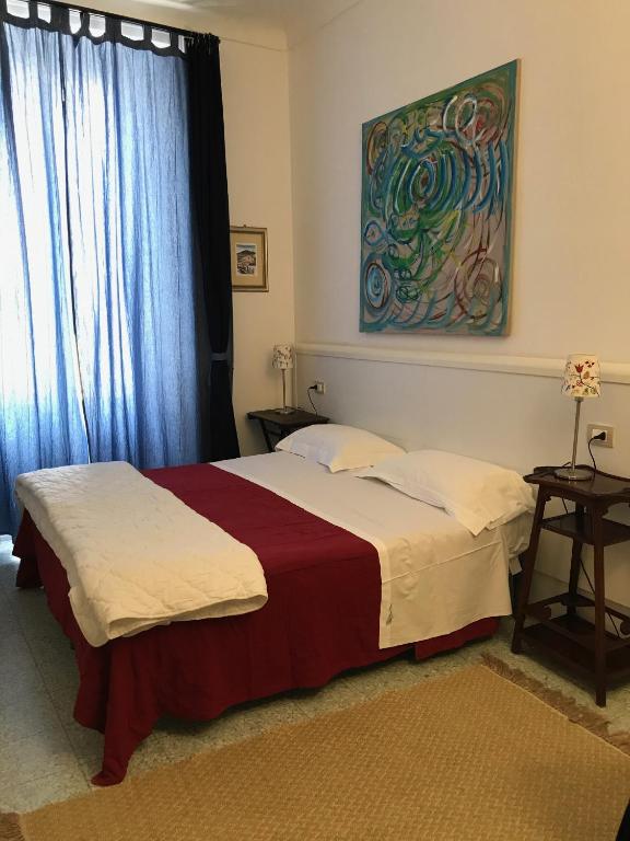 Postel nebo postele na pokoji v ubytování B&B Nike - Rooms Only