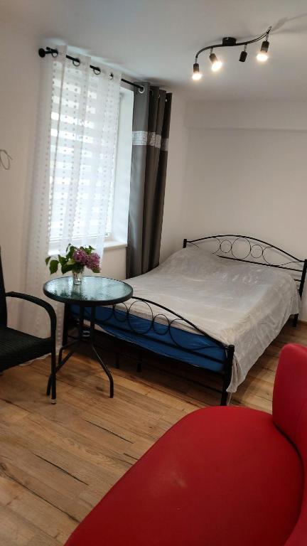 Posteľ alebo postele v izbe v ubytovaní SORKWITY- Pensjonat - STARY GIELĄD