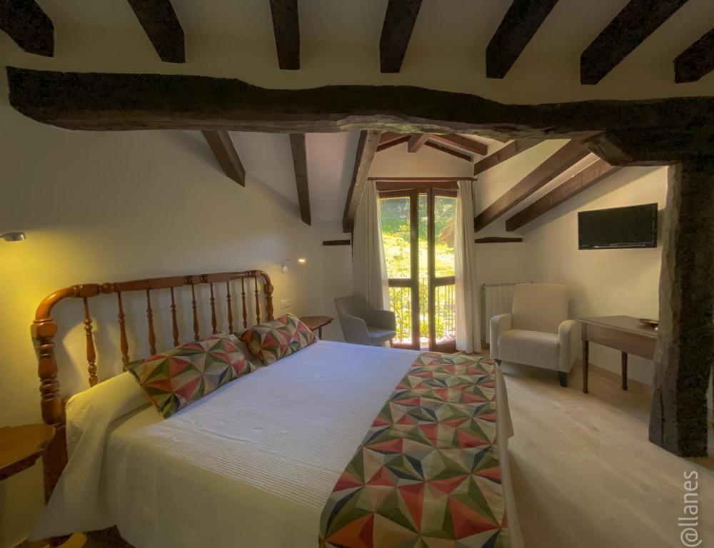 Cama o camas de una habitación en Posada Las Espedillas