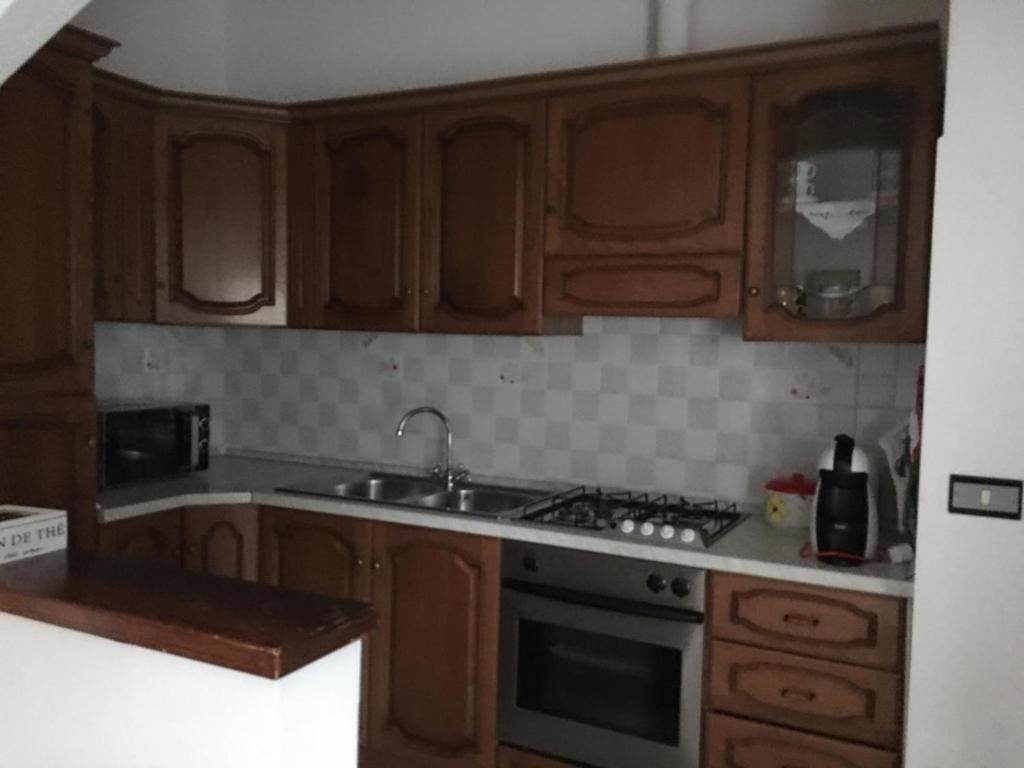Kuchnia lub aneks kuchenny w obiekcie L Agrifoglio di Rita Loddo