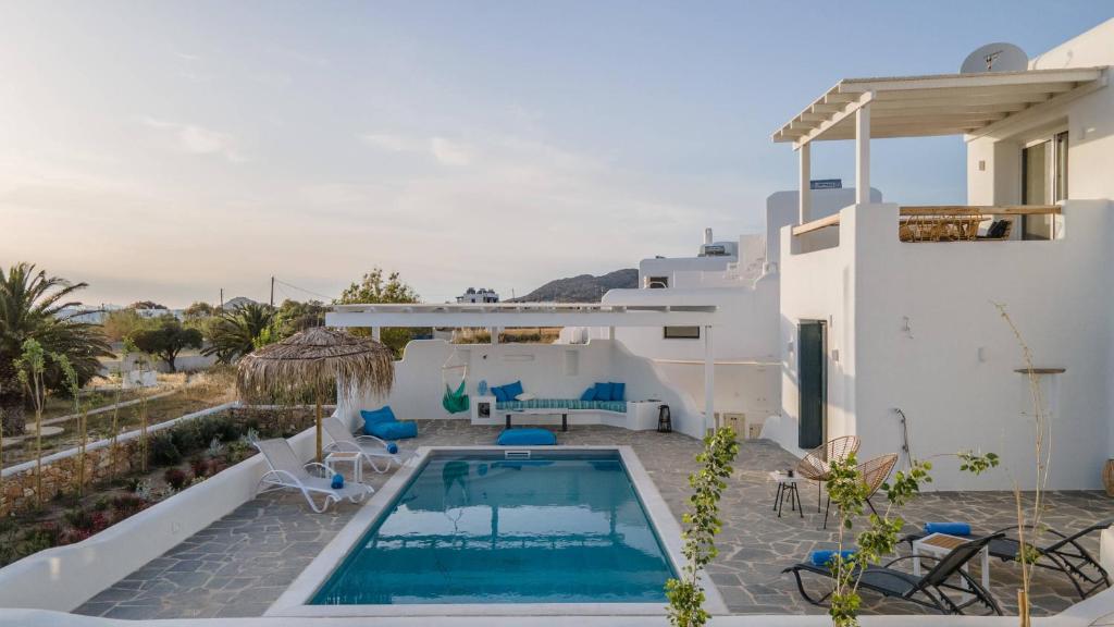 a view of a house with a swimming pool at Villa Ester Naxos in Kastraki Naxou