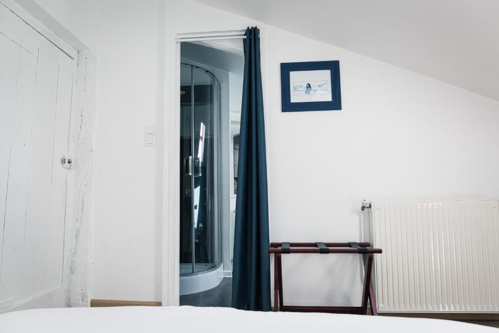 Postel nebo postele na pokoji v ubytování Le Pressoir chambres d'hôtes