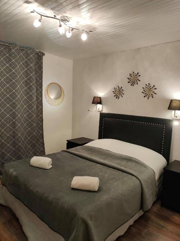 Postel nebo postele na pokoji v ubytování Hotel du Levant