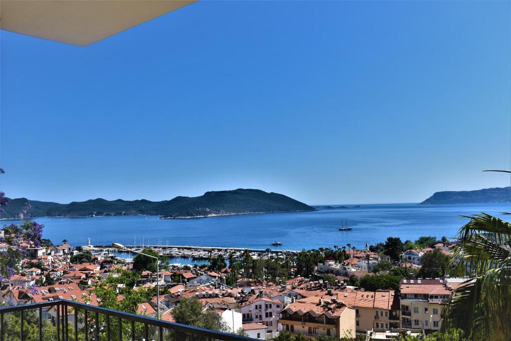 a view of a city and the water at Manzara Apartment in Kas