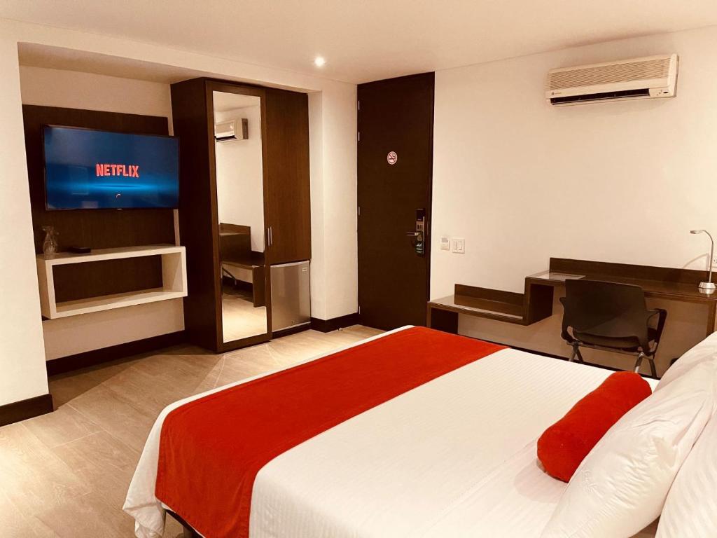 TV a/nebo společenská místnost v ubytování Hotel Loyds