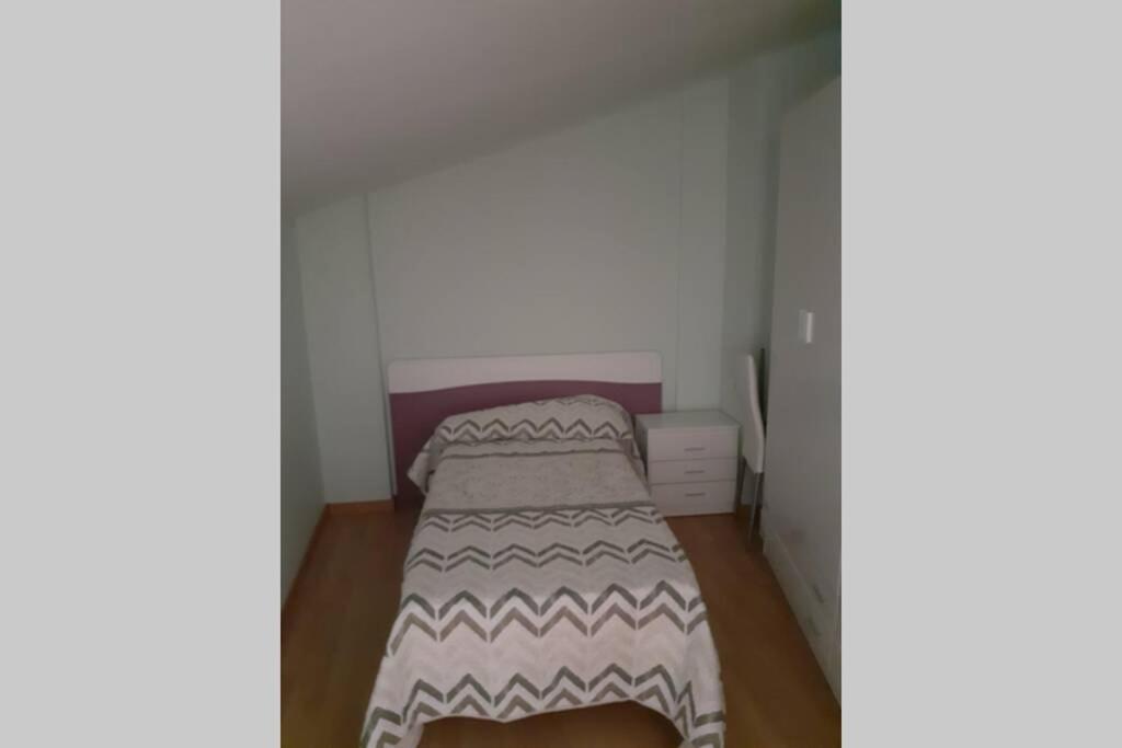 A bed or beds in a room at Duplex casco historico