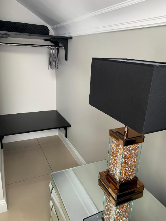 Televízia a/alebo spoločenská miestnosť v ubytovaní Willa Buk APARTAMENTY
