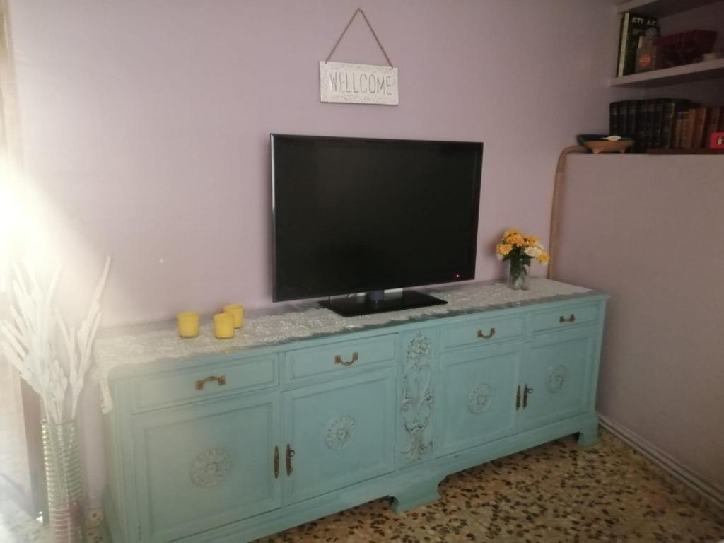 TV a/nebo společenská místnost v ubytování Ca la Glori