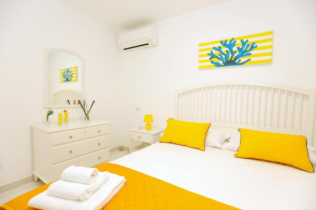 Posteľ alebo postele v izbe v ubytovaní My home Capri F