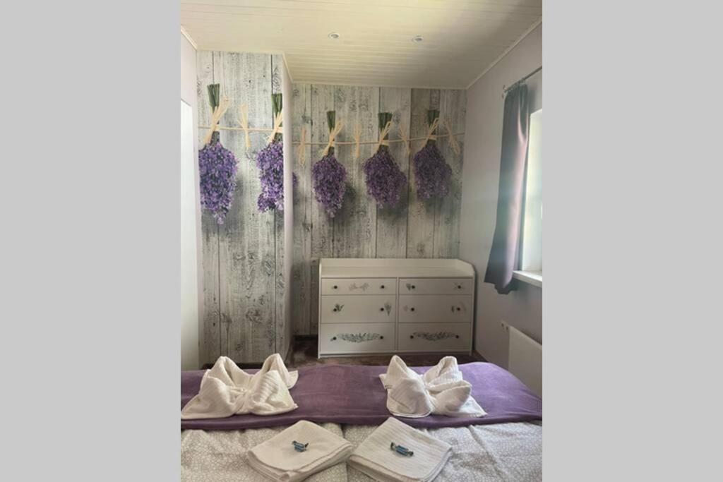 Posteľ alebo postele v izbe v ubytovaní Murzeit Apartman