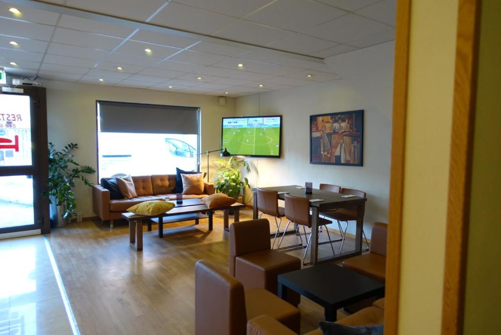 TV o dispositivi per l'intrattenimento presso Pizza House Bed Simrishamn