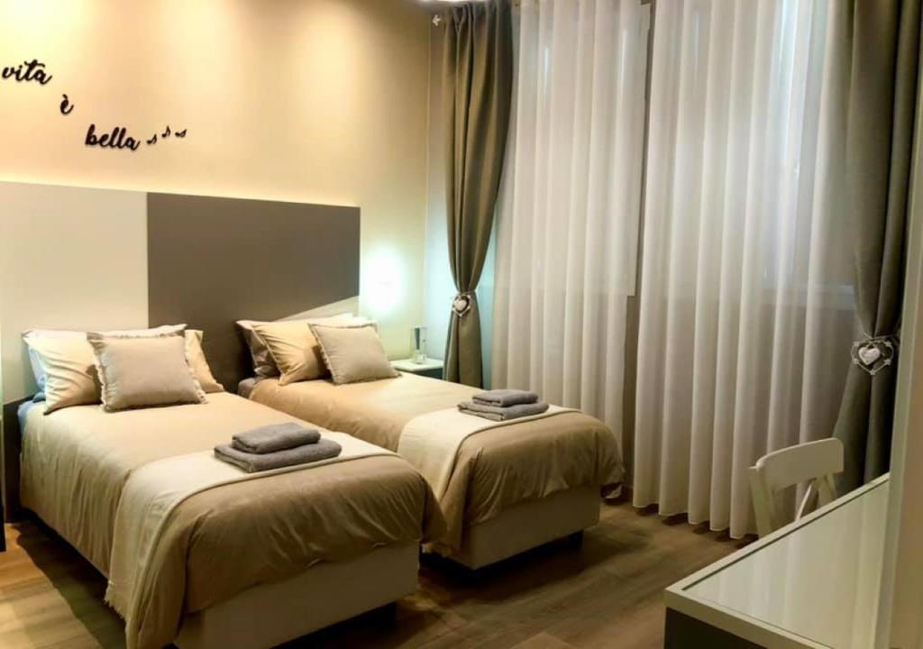 A bed or beds in a room at Room sweet Room 2