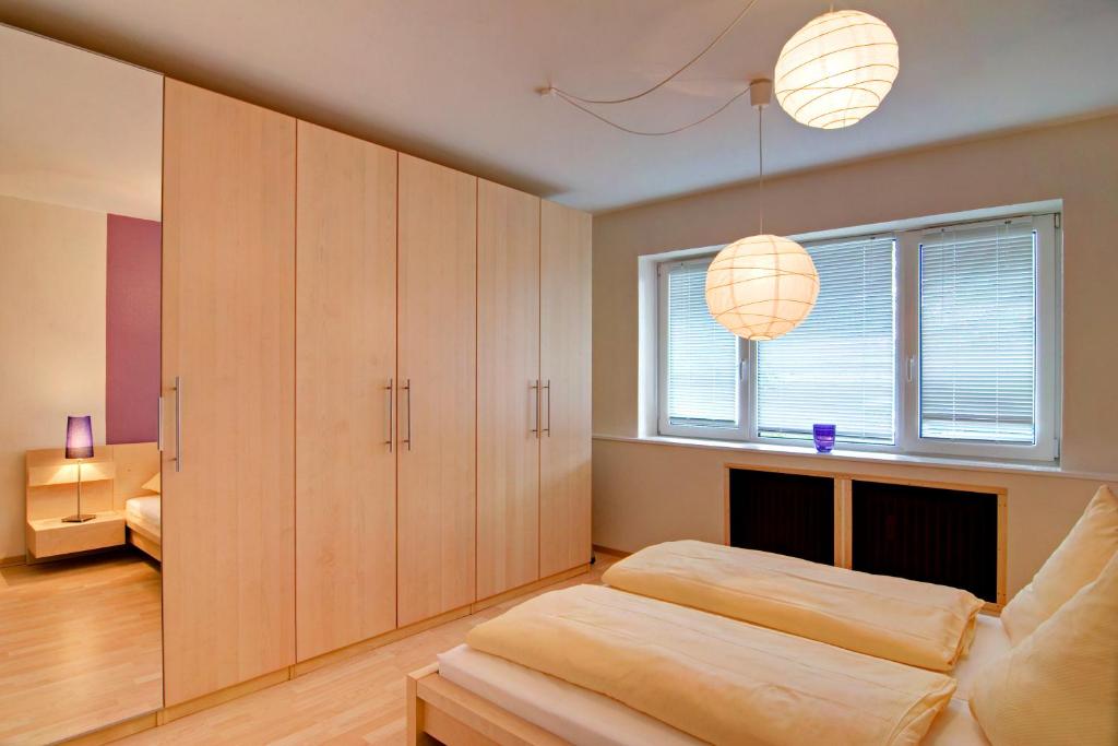 Postel nebo postele na pokoji v ubytování Hotel Am Mühlenteich
