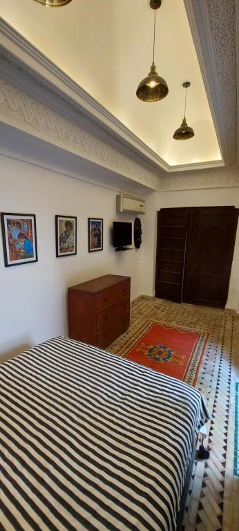 Postel nebo postele na pokoji v ubytování Riad Barroko