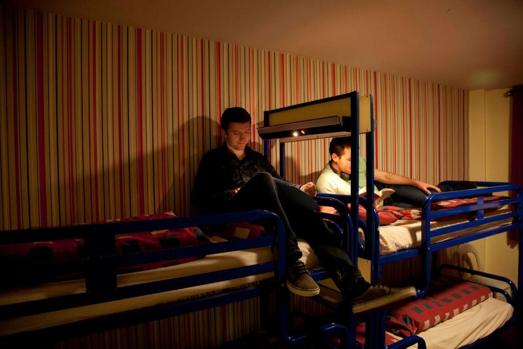 Postel nebo postele na pokoji v ubytování Abigail's Hostel