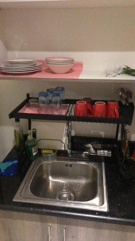 Kuchyň nebo kuchyňský kout v ubytování Staycation