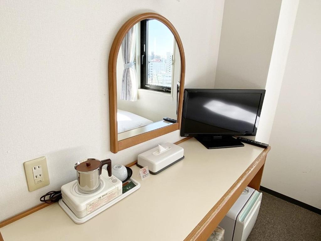 TV a/nebo společenská místnost v ubytování Smile Hotel Kitaasaka