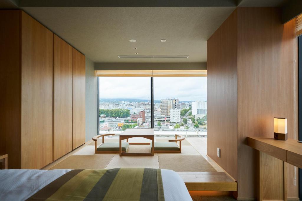 Łóżko lub łóżka w pokoju w obiekcie Fujisan Mishima Tokyu Hotel