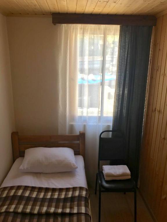 Postel nebo postele na pokoji v ubytování Guest House Gordila