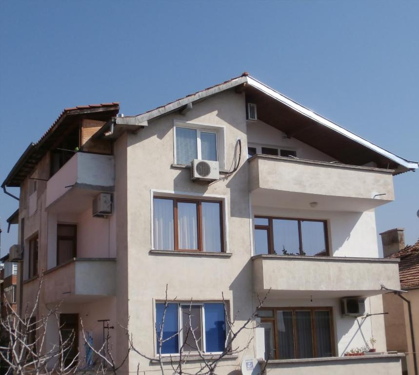 an apartment building in the city of ž at Apartments in House Silent Nature in Sandanski