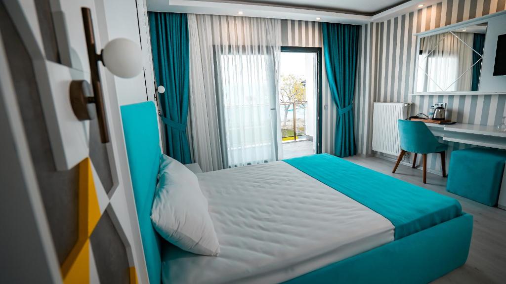 Postel nebo postele na pokoji v ubytování Sunsan Hotel