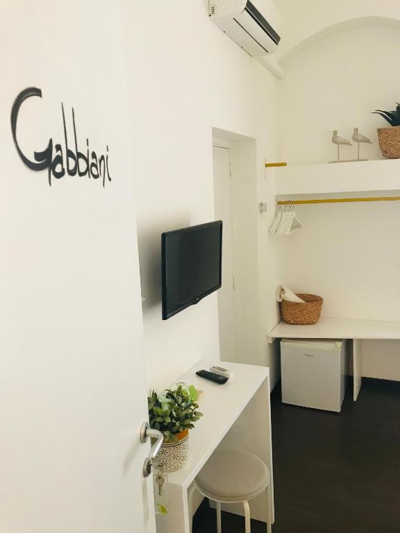 TV a/nebo společenská místnost v ubytování Matinee Rooms
